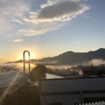 シンボルタワーと朝日